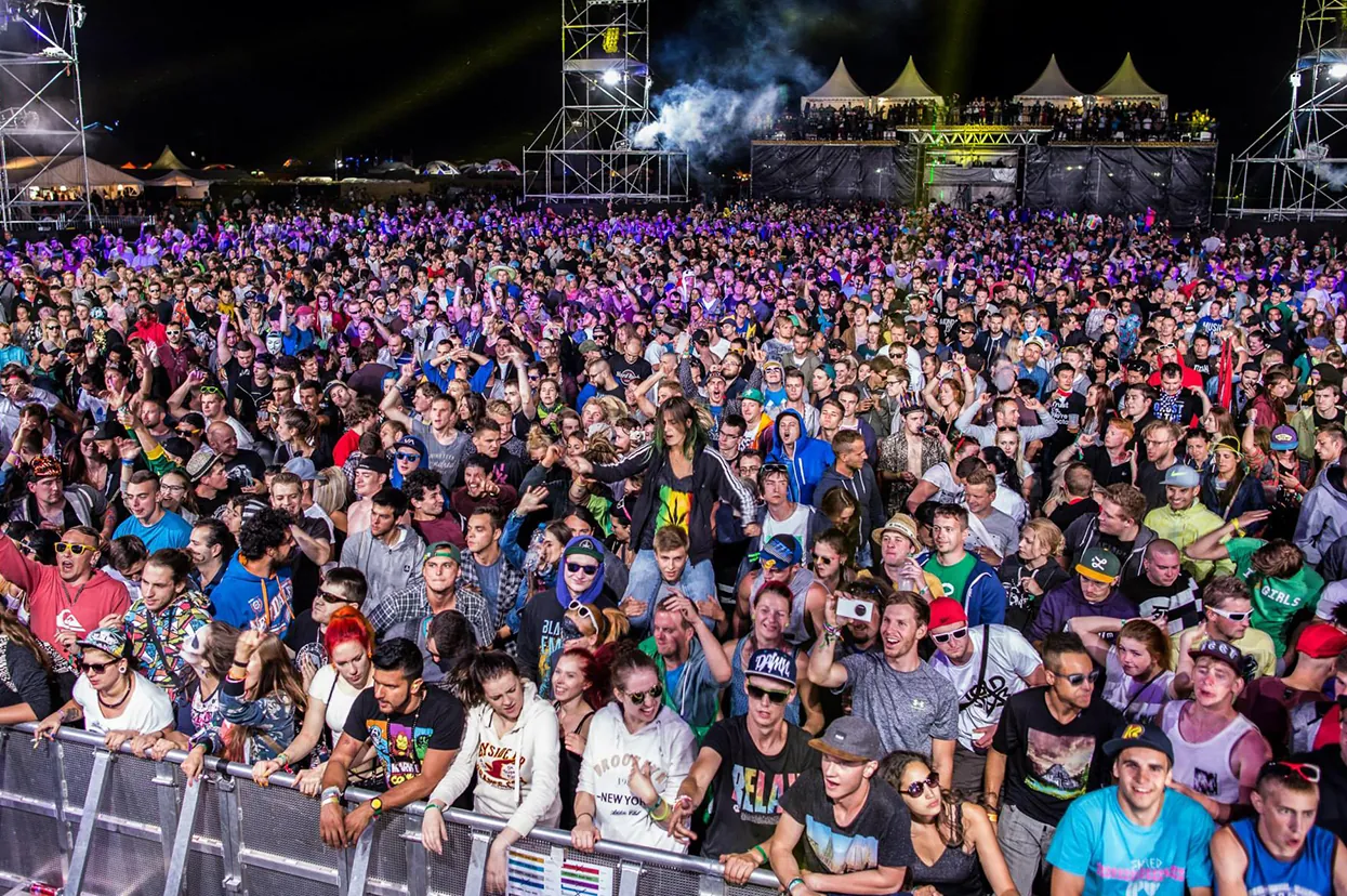 Festival crowd stretching back to the production tents